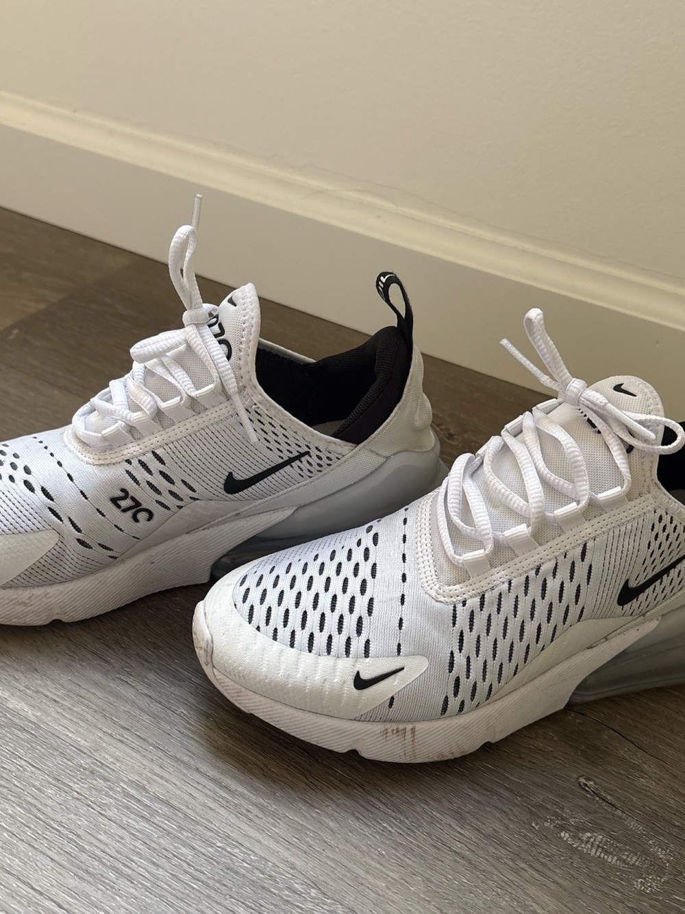 Nike White and Black Running Shoe with Subtle Maroon Accent